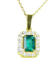 High quality yellow gold natural colombian emerald and diamonds pendant.