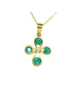 A 18k yellow gold necklace with 4 natural colombian emeralds pendant.