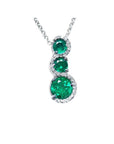 Three rounds cut natural colombian emerald pendant journey necklace with white gold chain.