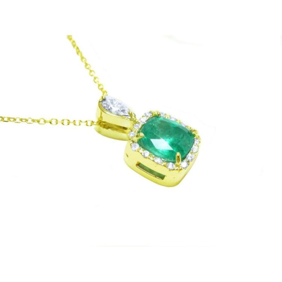 1.99 ct. cushion-cut emerald halo pendant with natural diamonds on a 14K yellow gold chain.