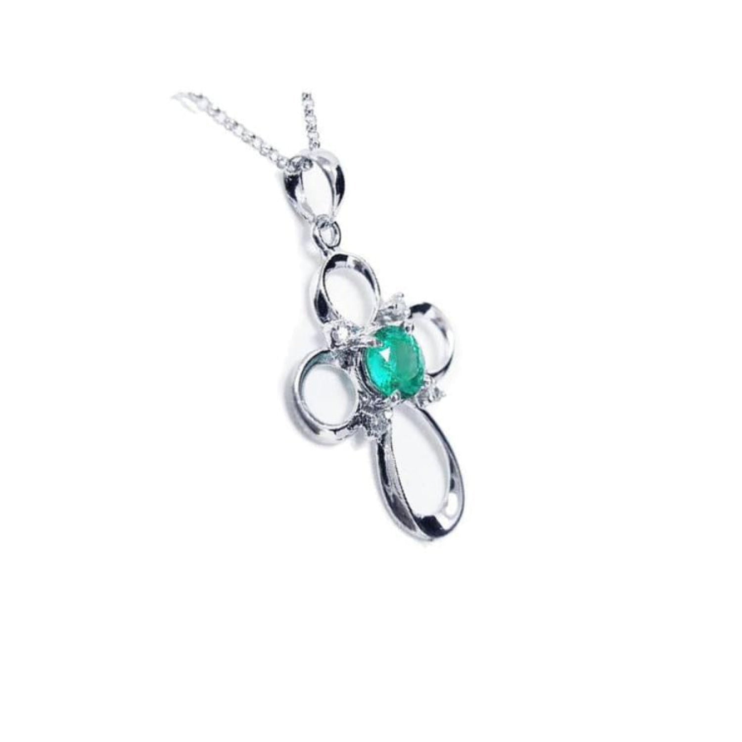 14K white gold cross pendant with a round natural Colombian emerald and diamond accents.