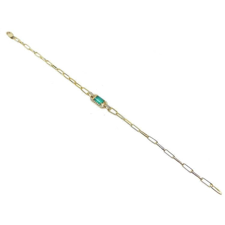 14K yellow gold paper clip bracelet with a rectangular natural emerald and diamond accents.