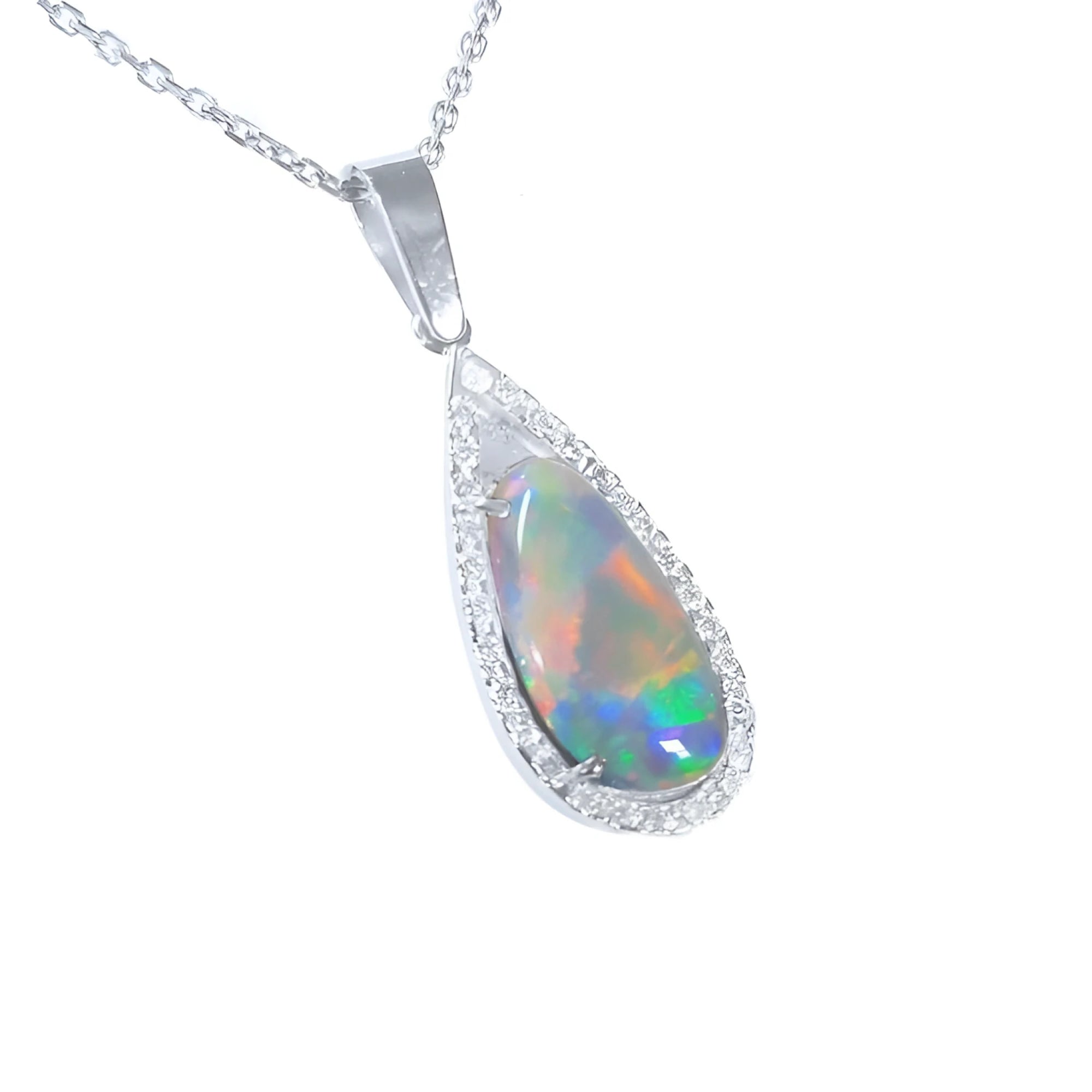 Pear-shaped Australian opal pendant with red, orange, blue, green play of color, halo diamonds, 18K white gold.