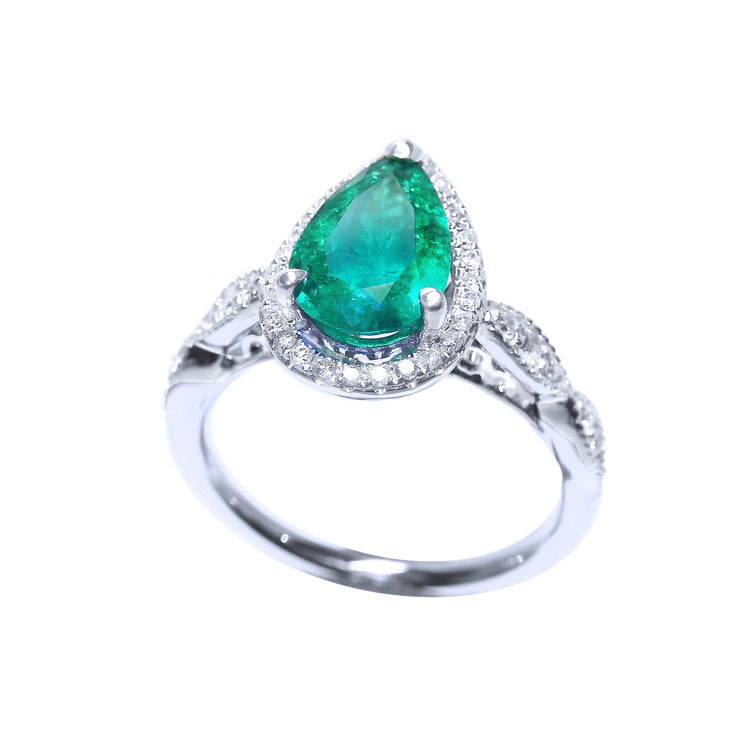 Emerald and diamond engagement ring bridal style pear cut engagement halo diamond milgrain deco 14k white gold