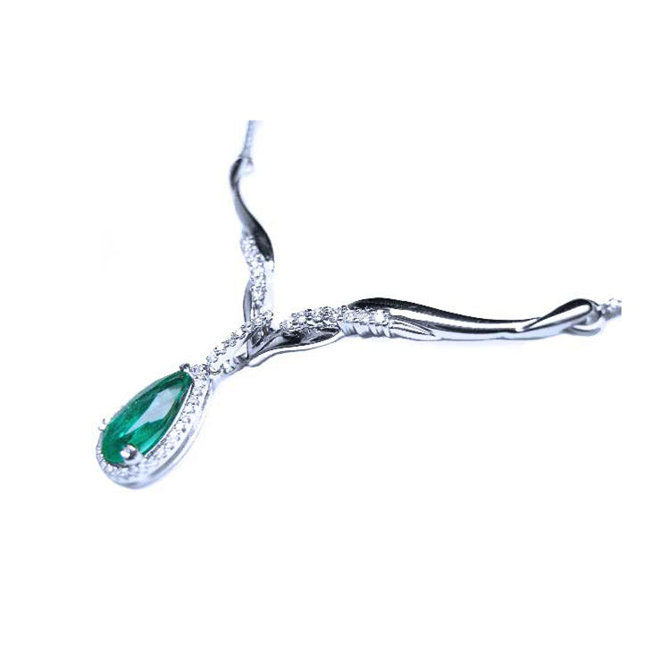 Gift for Mother&#39;s Day pear cut 1.28 carats sourced from Muzo mines encircled by a halo diamond crafted in 14k white gold