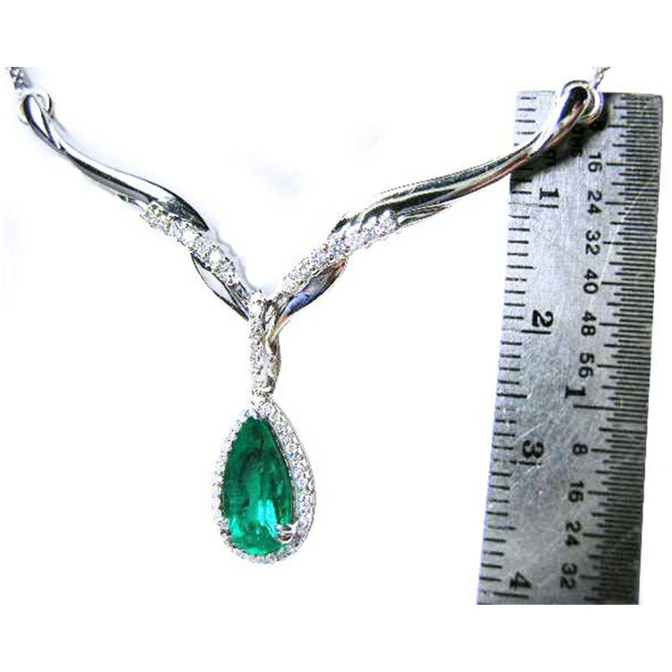 Bridals&#39; emerald necklace pear cut 1.28 carats sourced from Muzo mines encircled by a halo diamond crafted in 14k white gold