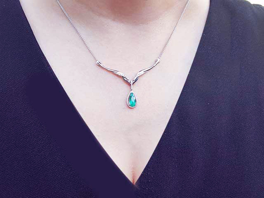 natural diamond Emerald necklaces pear cut 1.28 carats sourced from Muzo mines, halo diamond crafted in 14k white gold