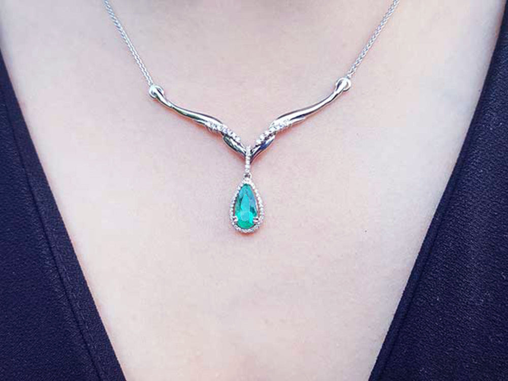 Ladies Emerald necklaces USA made pear cut 1.28 carats, Muzo mines encircled by a halo diamond crafted in 14k white gold