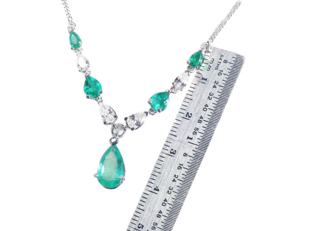Colombian Emerald necklaces natural diamonds pear shaped linked in 14k white gold settings with a wheat style chain