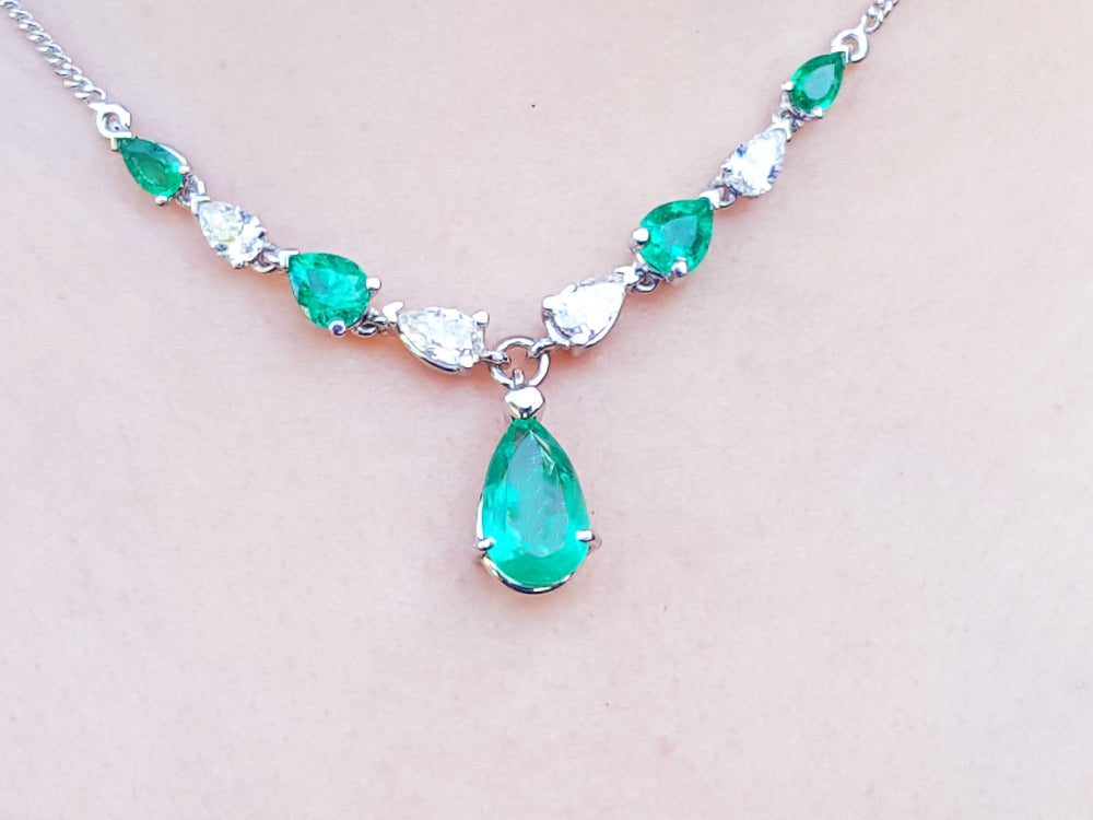 Pear shaped Emerald necklaces natural diamonds linked in 14k white gold individual settings with a wheat style chain