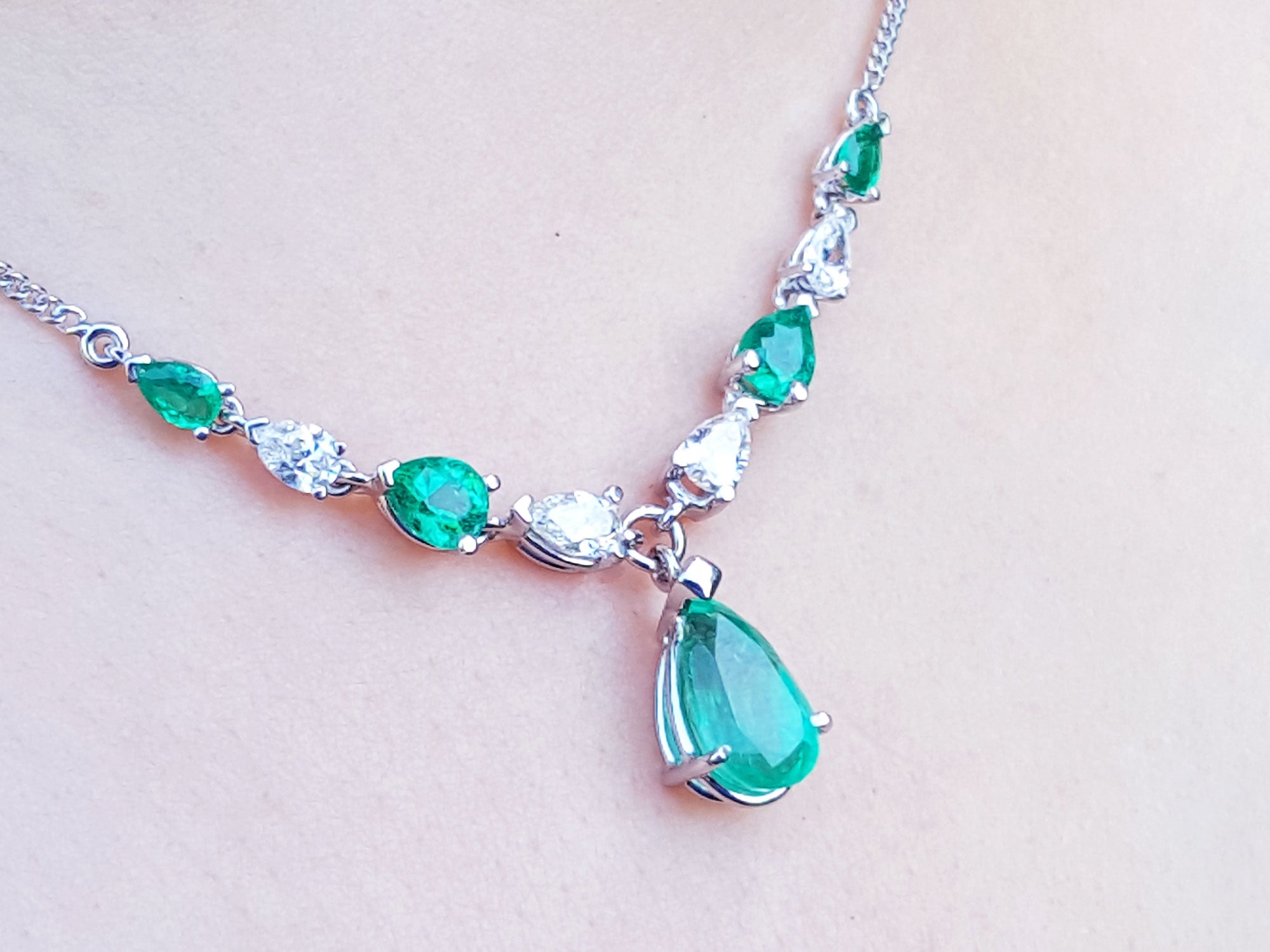 White gold 14k Emerald necklaces for sale natural diamonds pear shaped linked with individual settings wheat style chain