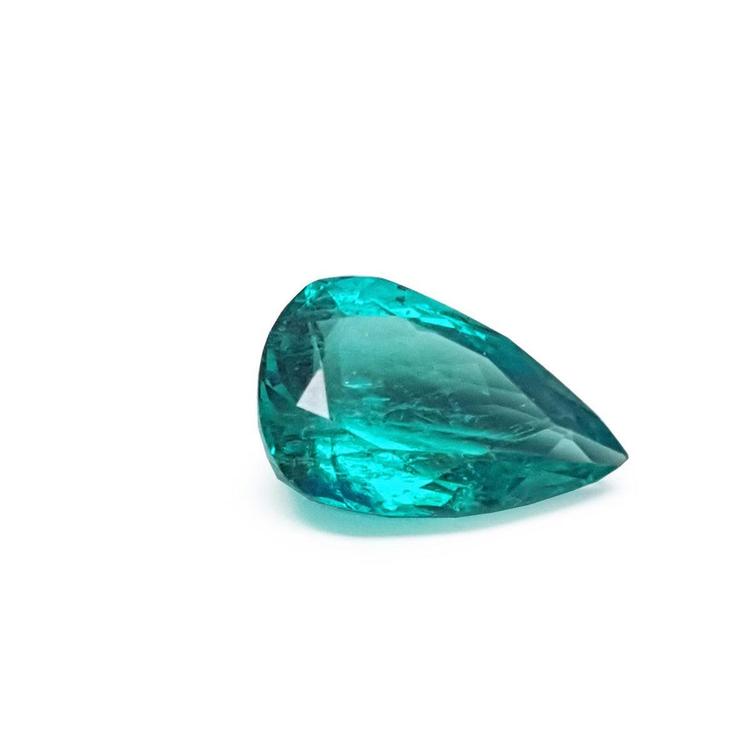 Pear cut loose colombian emerald for sale, front right position table and crown view