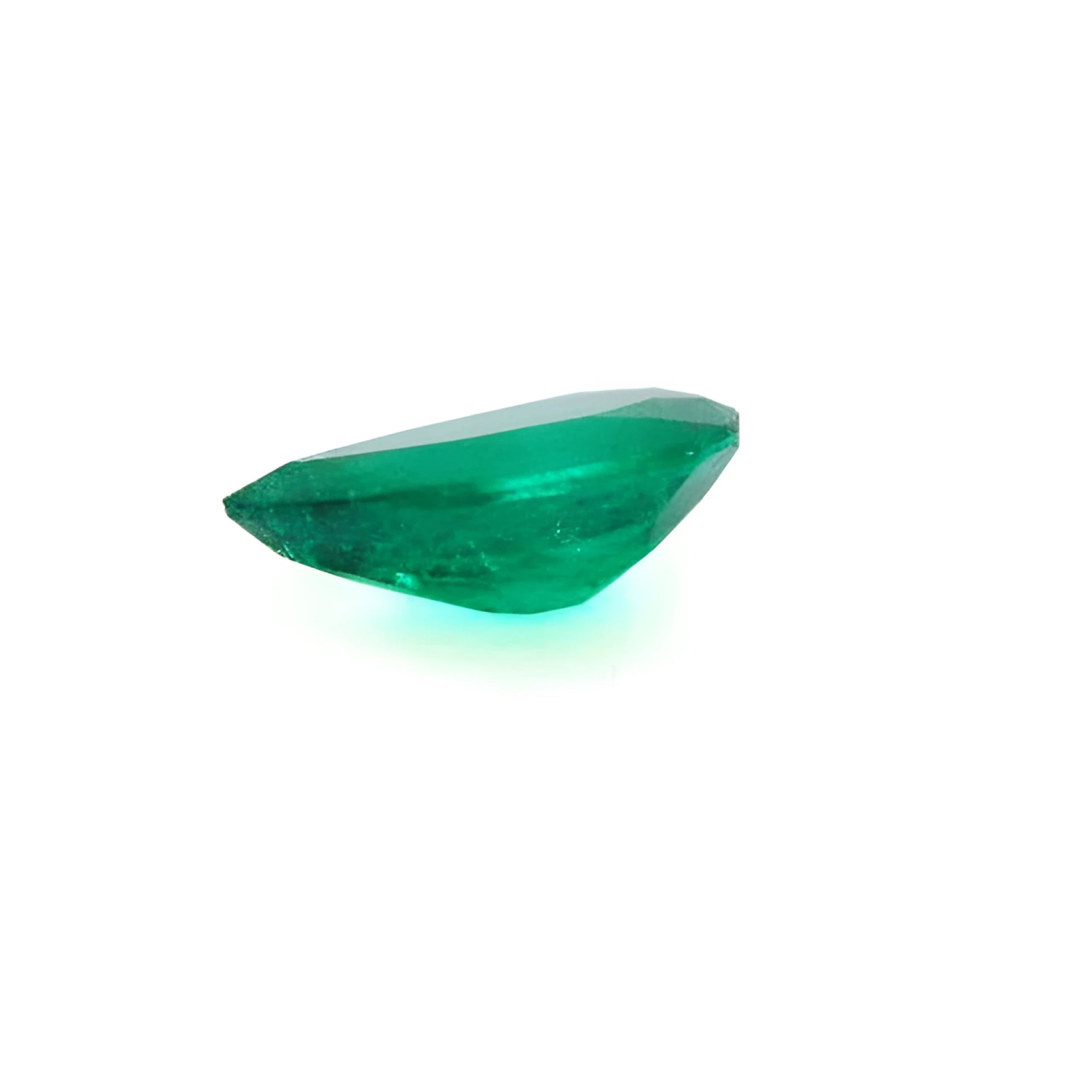 1.74-carat pear-cut Colombian emerald, vibrant deep bluish-green, on a white background.