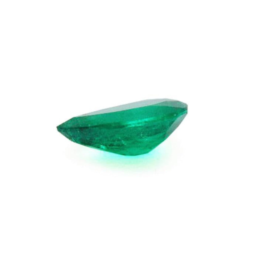 1.74-carat pear-cut Colombian emerald, vibrant deep bluish-green, on a white background.
