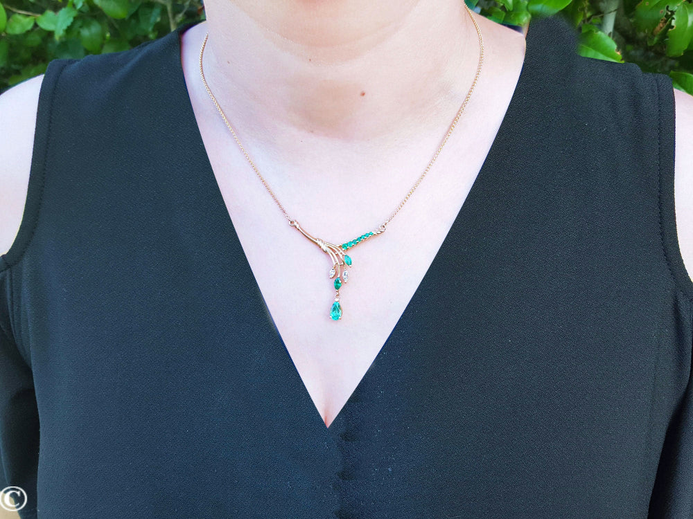 Ladies&#39; 14k yellow gold emerald necklace pear shaped, marquises and round cut emeralds with natural diamonds