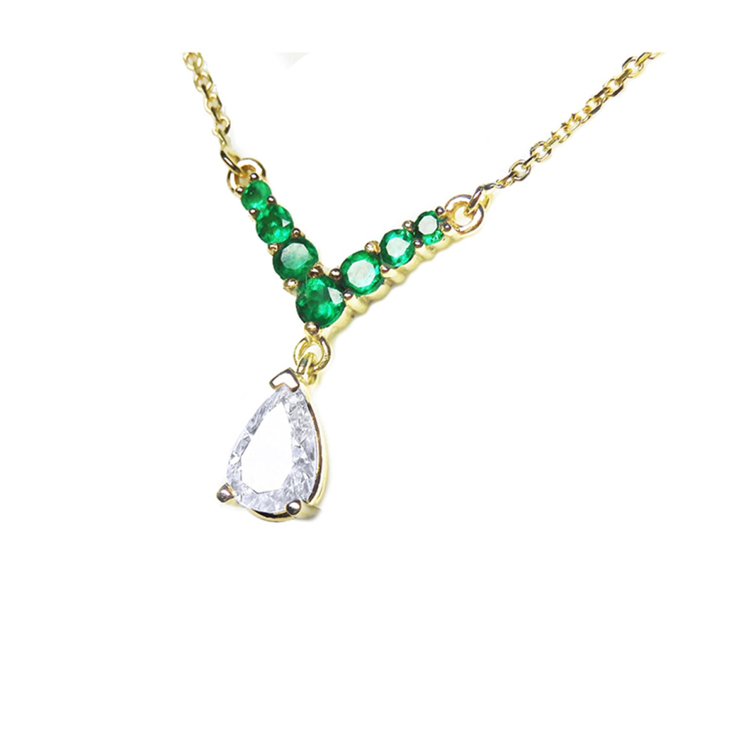 14K gold necklace with a 0.69 ct pear diamond and seven round emeralds in a V-shape.