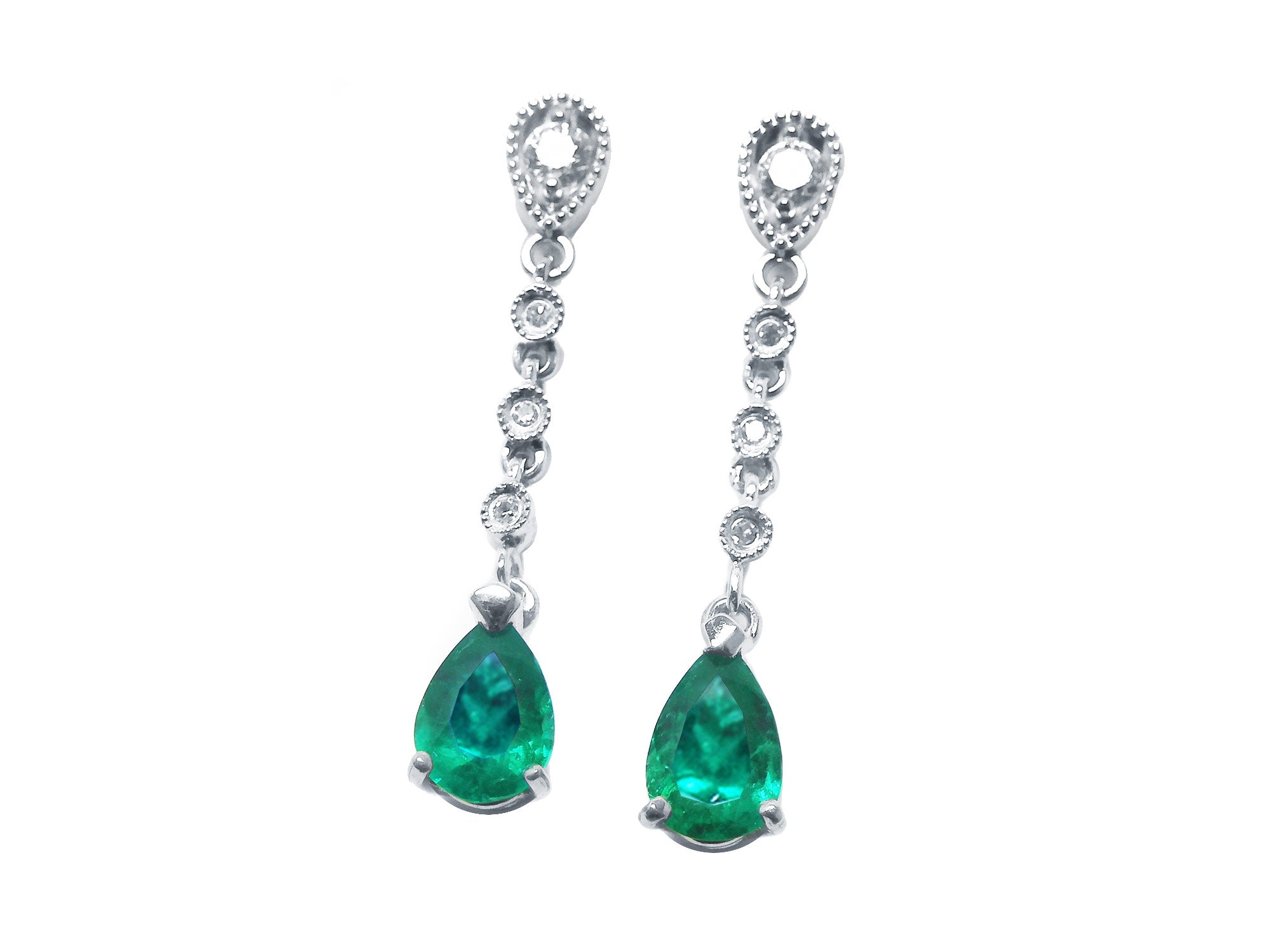 Pair of emerald teardrop earrings with diamond accent on a front position top view