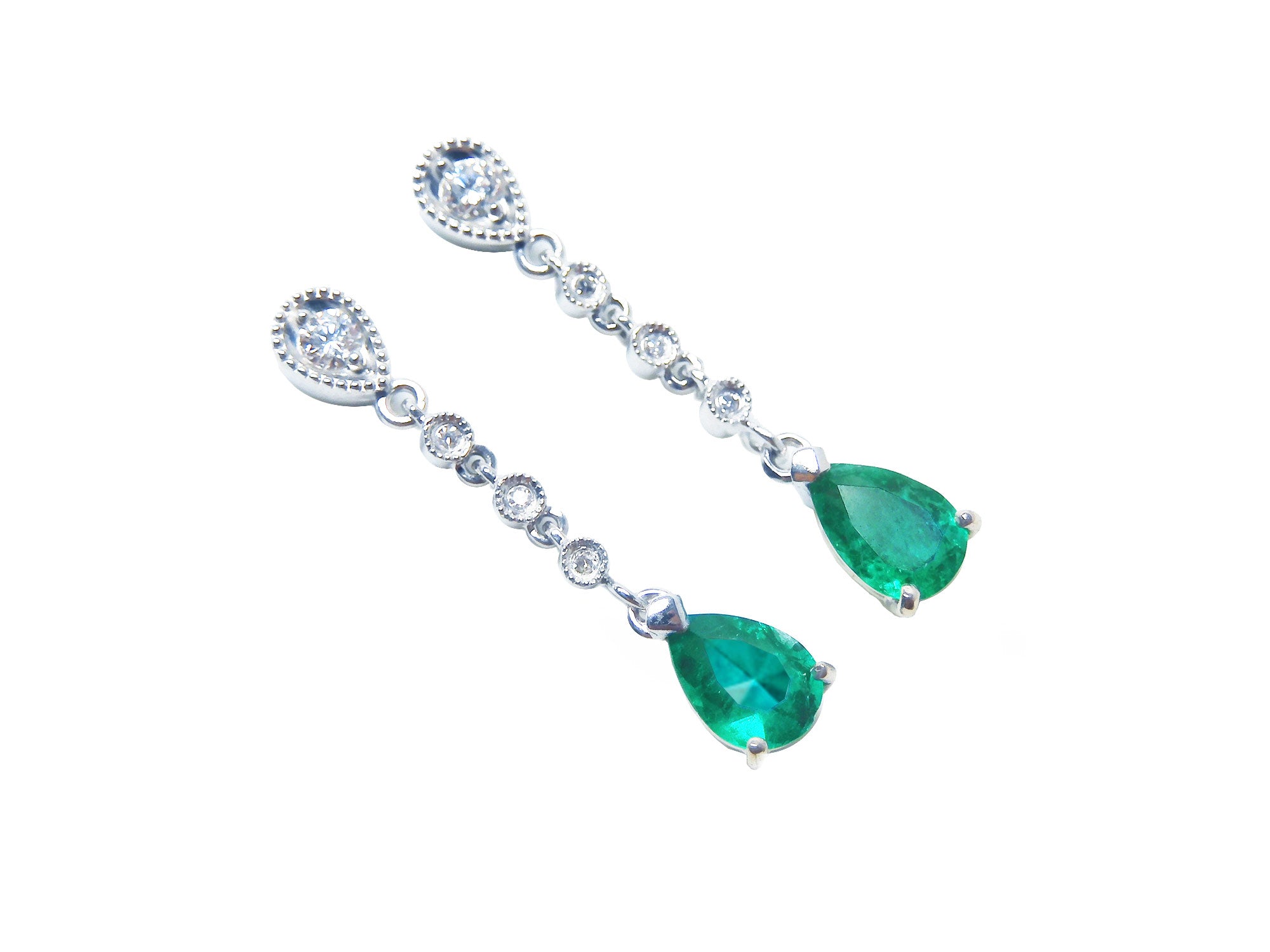 Pear shaped emerald drop earrings in 14k white gold, right position top view