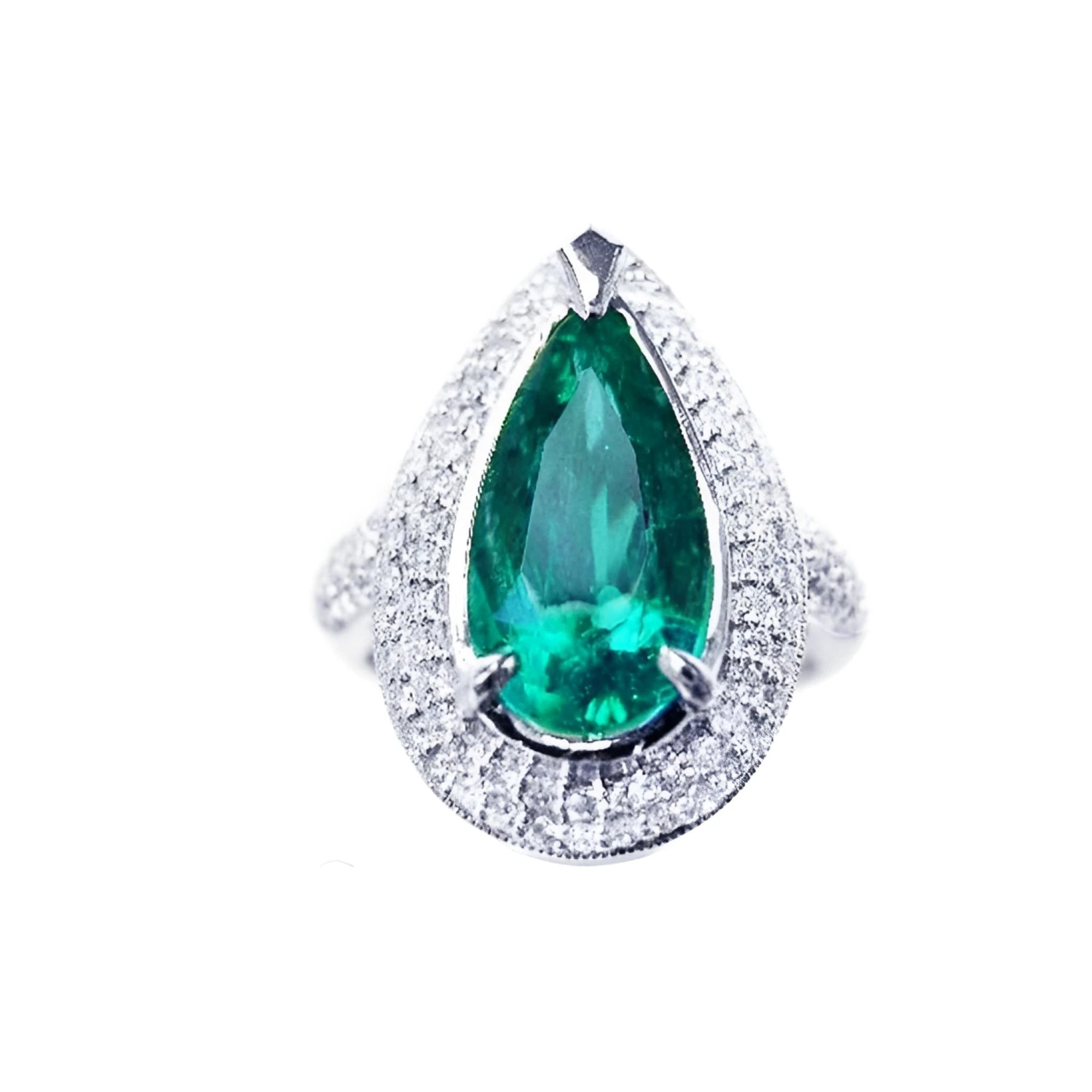 An emerald ring, pear shaped held by three prong set, encircled by double halo diamond, in 14k white gold.
