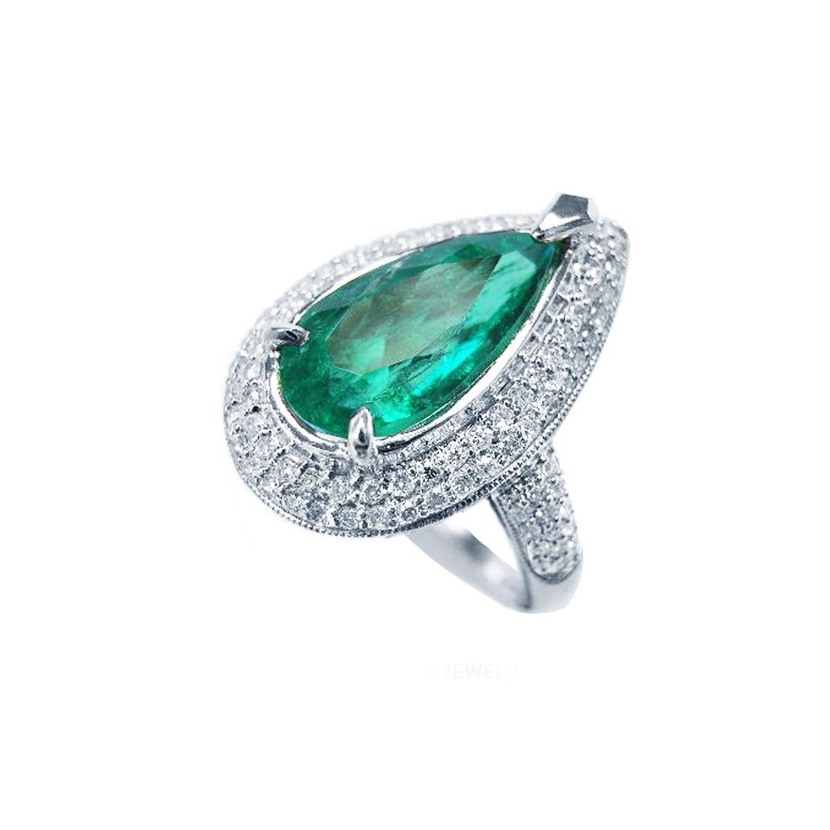 A natural emerald engagement ring, pear shaped green gemstone held by three prong set, top and right-side profile view.