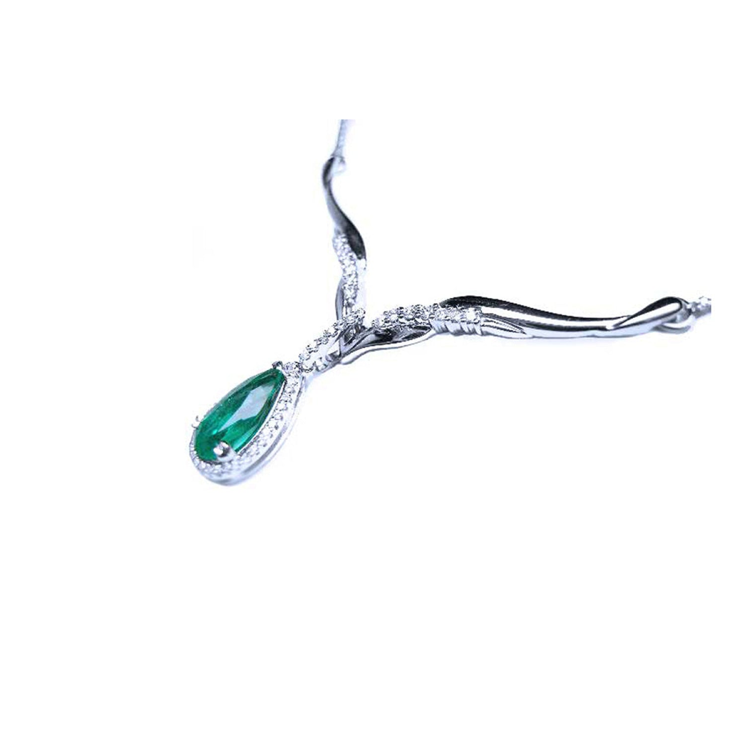 14K white gold necklace with a pear-cut emerald pendant surrounded by diamonds and entwined chevron design.