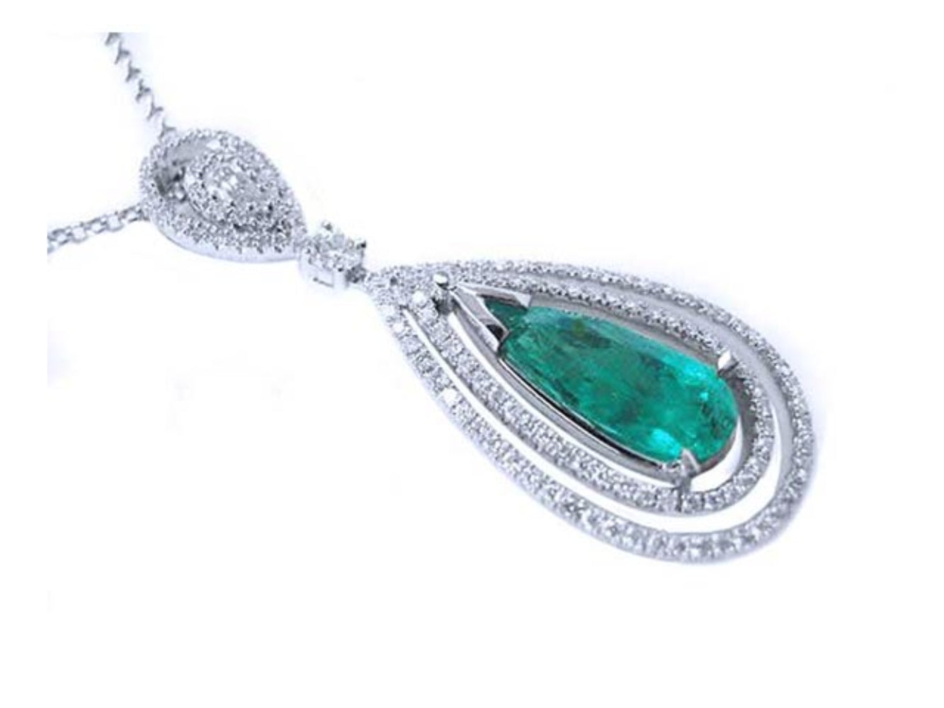 Teardrop-shaped emerald pendant with diamond accents on a white background
