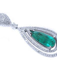 Teardrop-shaped emerald pendant with diamond accents on a white background