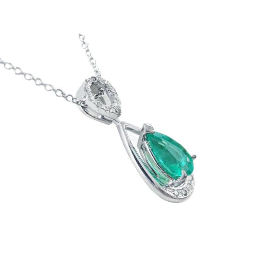 1.35 ct. natural pear-shaped emerald pendant necklace in 14K white gold with diamond accents.
