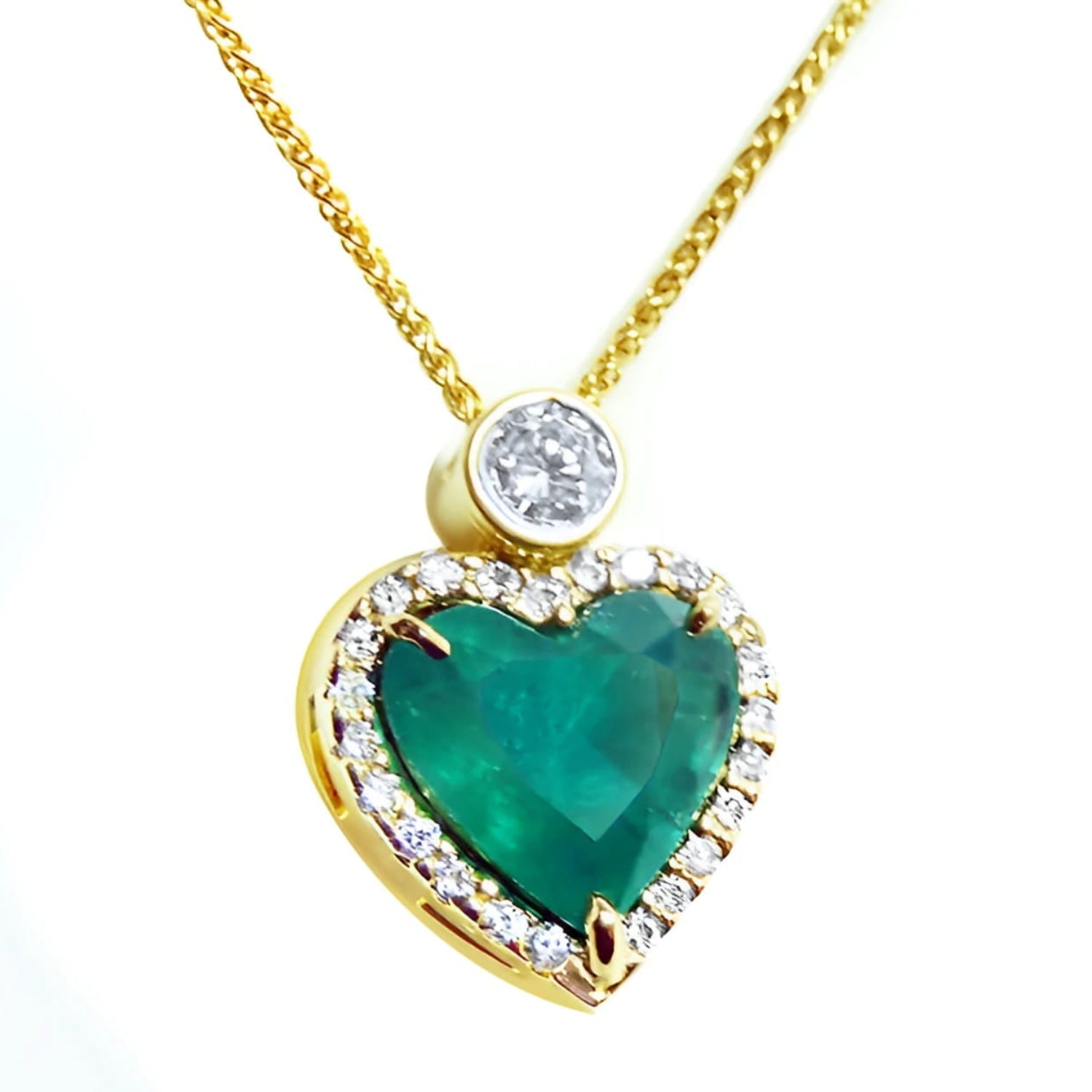 Pendientes o dijes en oro con esmeraldas colombianas y diamantes naturales para mujer.