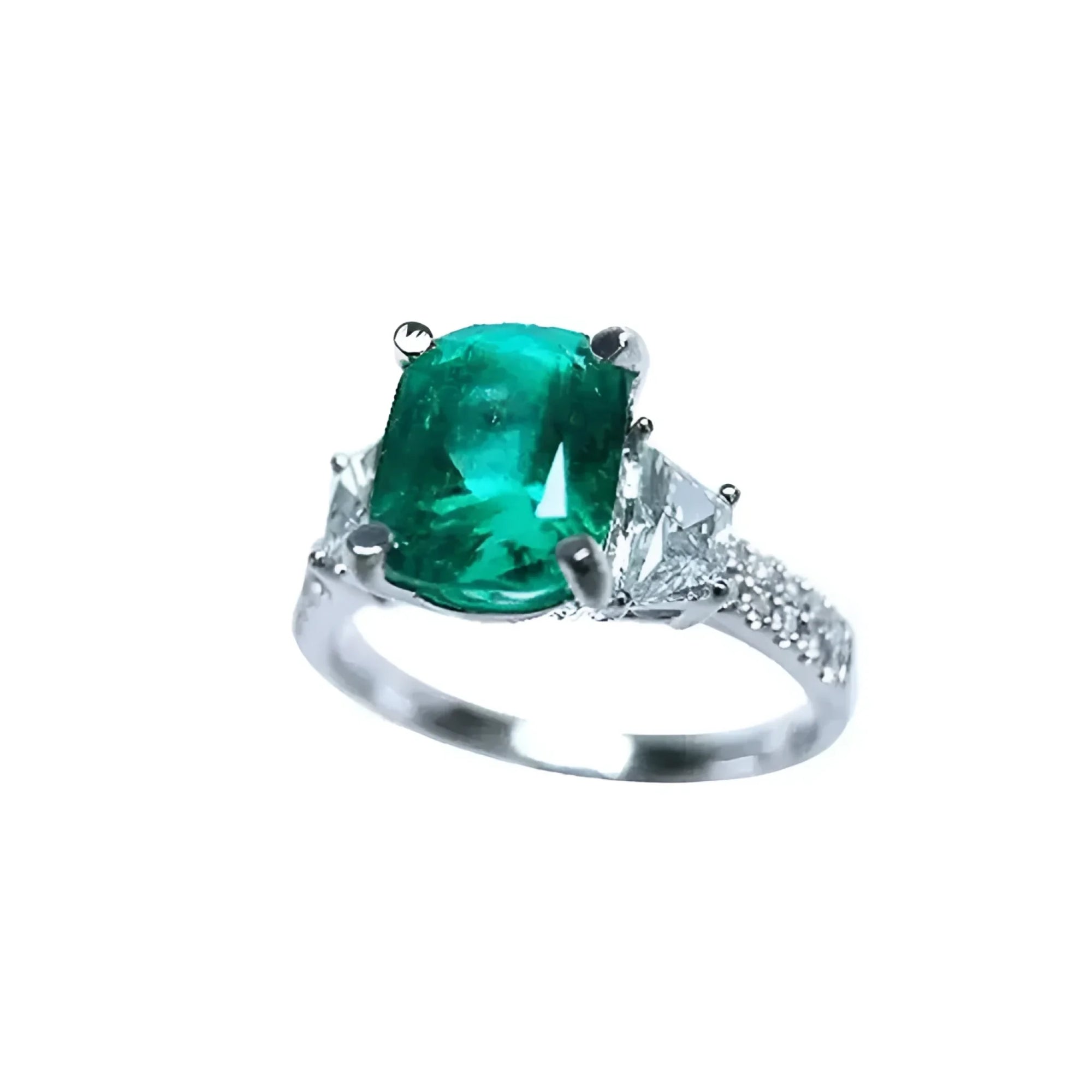Anillo de compromiso de oro blanco 18k con esmeralda colombiana y diamantes trapezoidales.