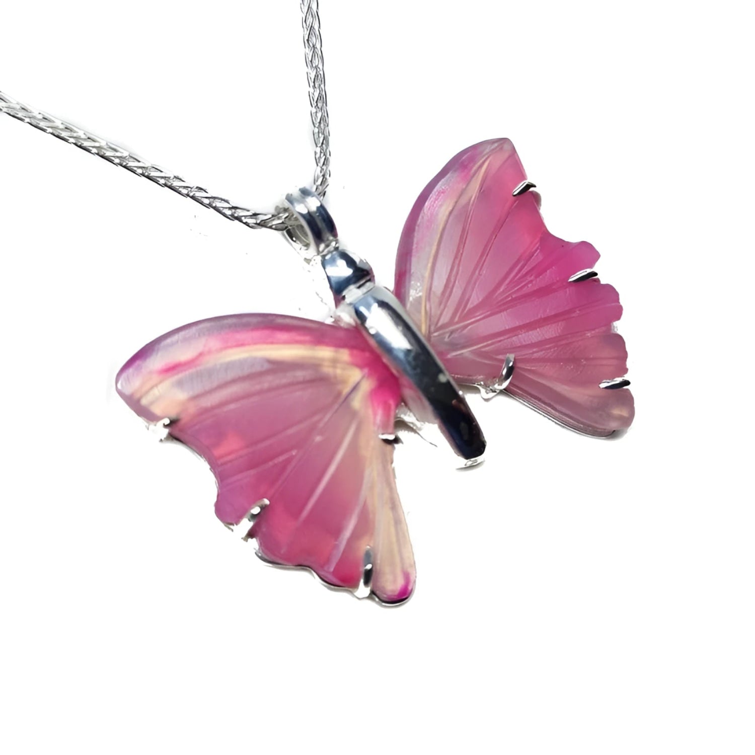 Pink natural agate butterfly pendant with carved wings on a sterling silver necklace.