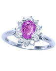 Sapphire ring for women in 14k white gold, features a natural pink sapphire with a radiant oval cut, surrounded by a halo of prong-set natural diamonds.