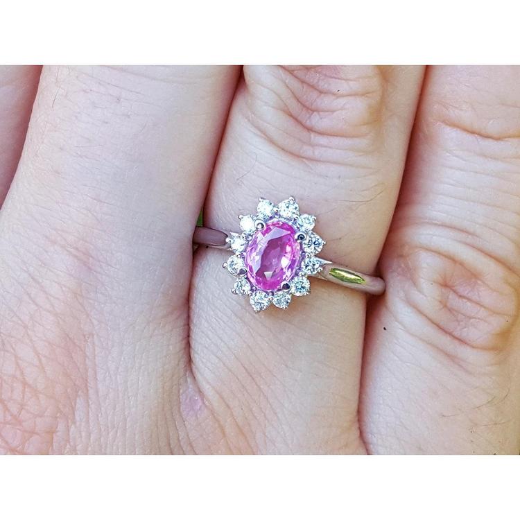 Natural pink sapphire ring for women halo diamond in 14k white gold, on a finger