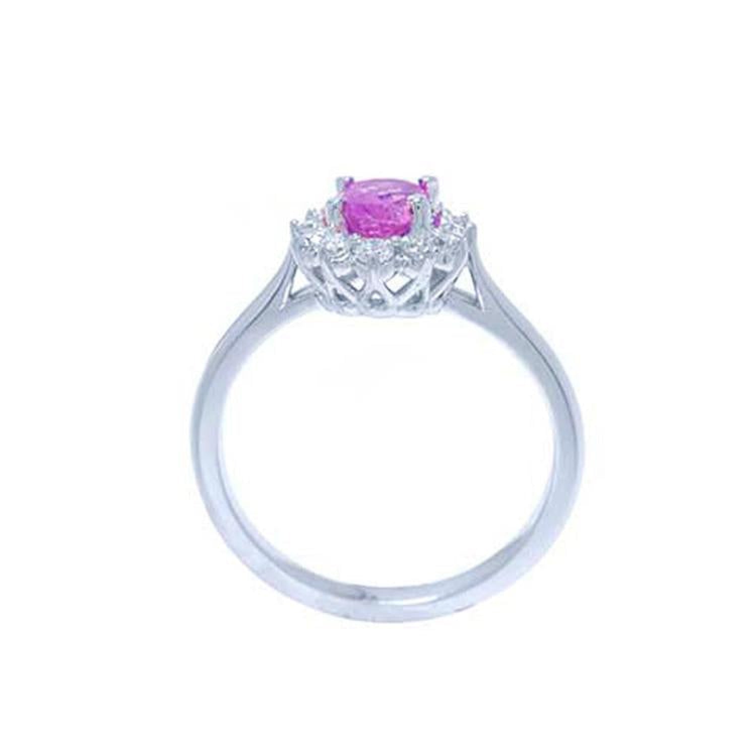 14K white gold women's ring with oval pink sapphire and diamond halo.