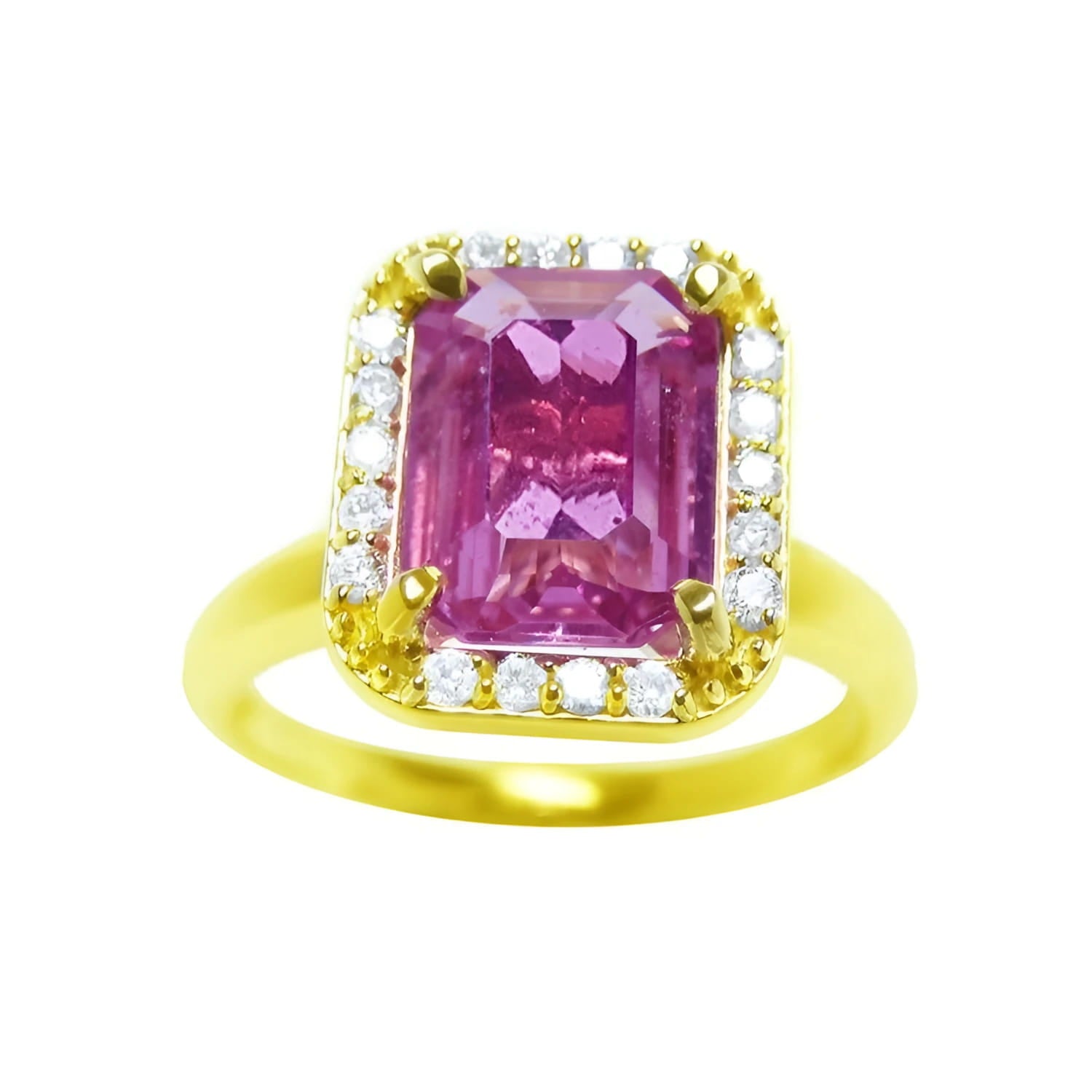 This pink sapphire ring for women showcases a sparkling, eye-clean emerald cut, surrounded by halo diamonds and set in 14k yellow gold.