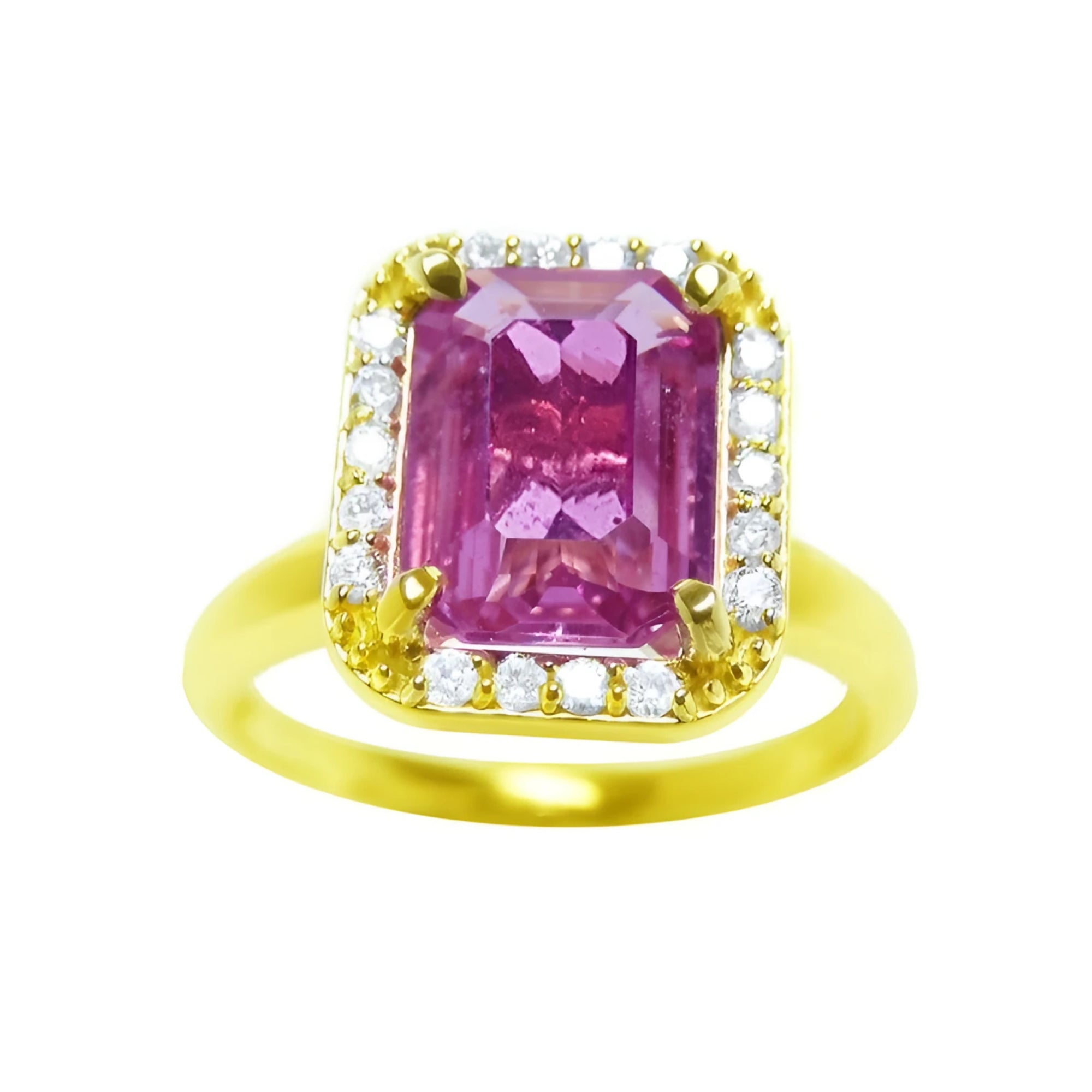 This pink sapphire ring for women showcases a sparkling, eye-clean emerald cut, surrounded by halo diamonds and set in 14k yellow gold.