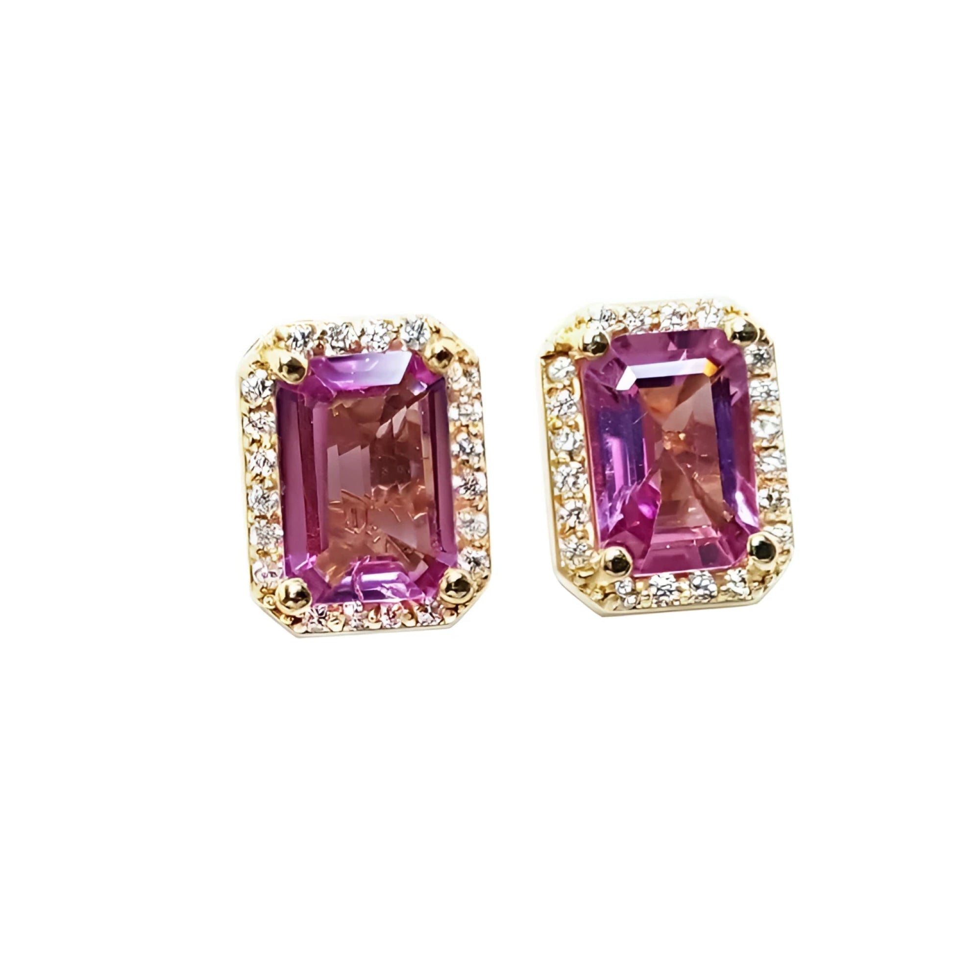 Natural pink sapphire stud earrings halo diamonds crafted in 14k yellow gold.