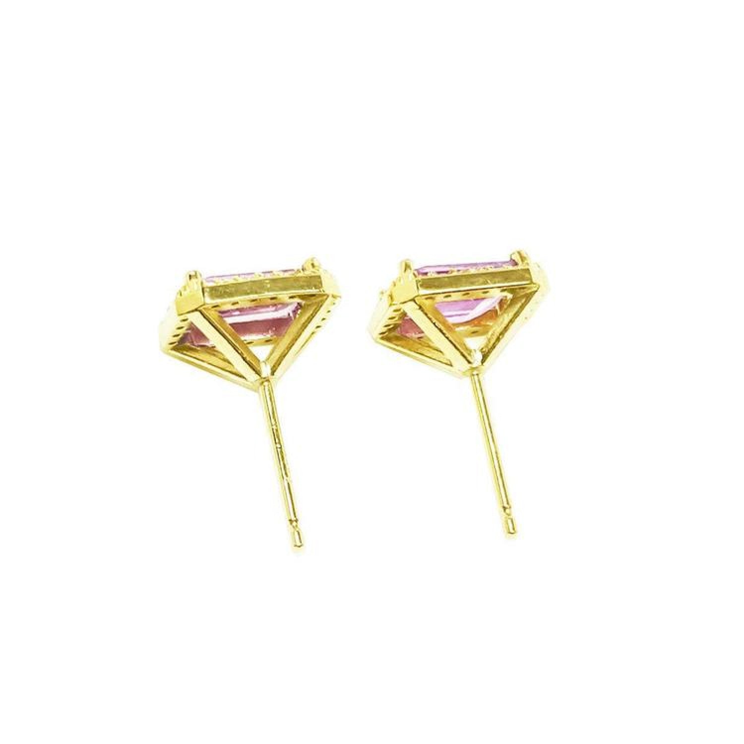 1.79 carat natural pink sapphire stud earrings with halo diamonds in 14K yellow gold.