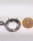 White gold pendant mounting 14k with halo diamond and round Ethiopian opal.