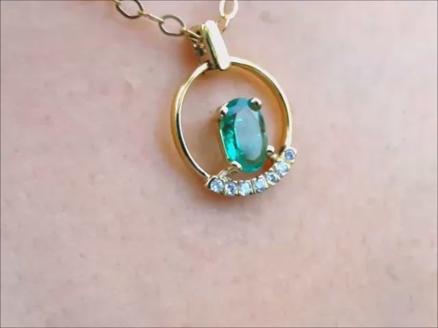 14k yellow gold emerald pendant necklace for women.