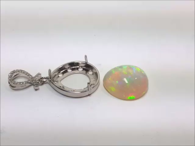 14k white gold ethiopian opal pendant teardrop.
