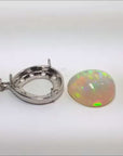 14k white gold ethiopian opal pendant teardrop.