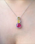 Ruby and sapphire journey pendant necklace, Accent diamonds white gold