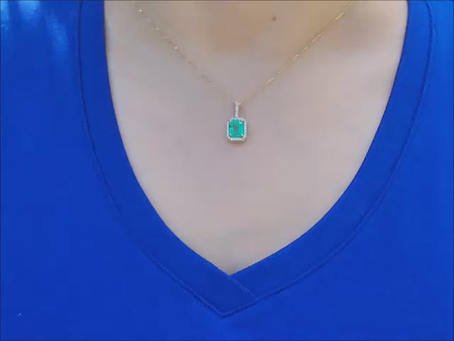Natural colombian emerald pendant necklace with a halo diamond