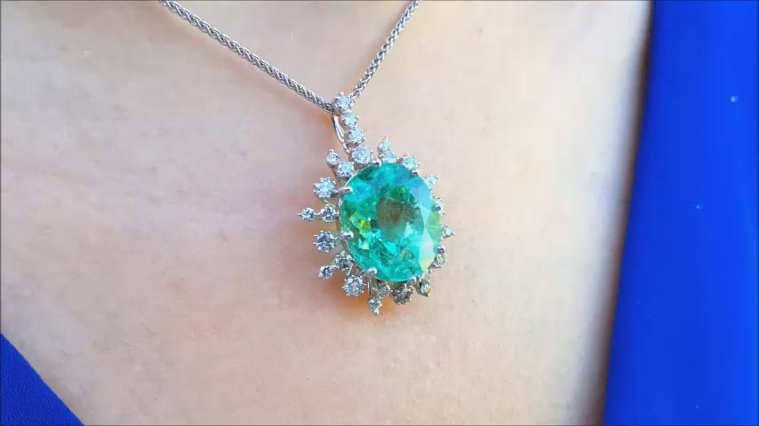 Oval natural emerald pendant halo diamond white gold