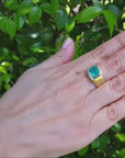 GIA certified F1 natural colombian emerald ring for men in 18k yellow gold.