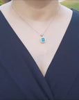 Emerald cut halo emerald pendant necklace 2.27 ct.