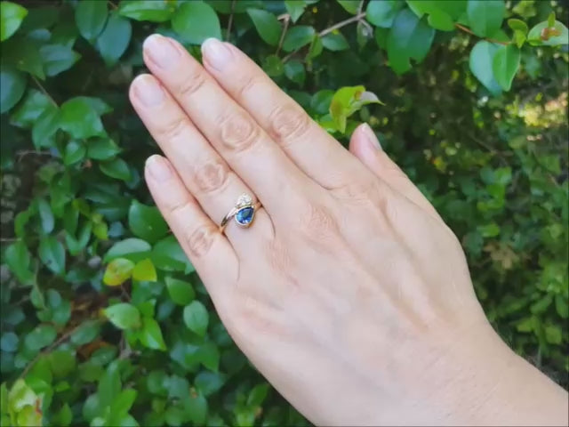 Bypass two stone sapphire and diamond you and me ring in 18k yellow gold toi et moi design.
