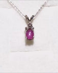 Star pink sapphire pendant necklace for ladies in 14k white gold.