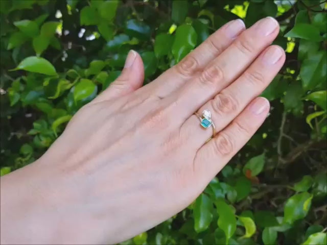 A 18k yellow gold toi et moi emerald and diamond ring you and me engagement ring.